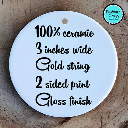 Round ceramic tag with text on a wooden background