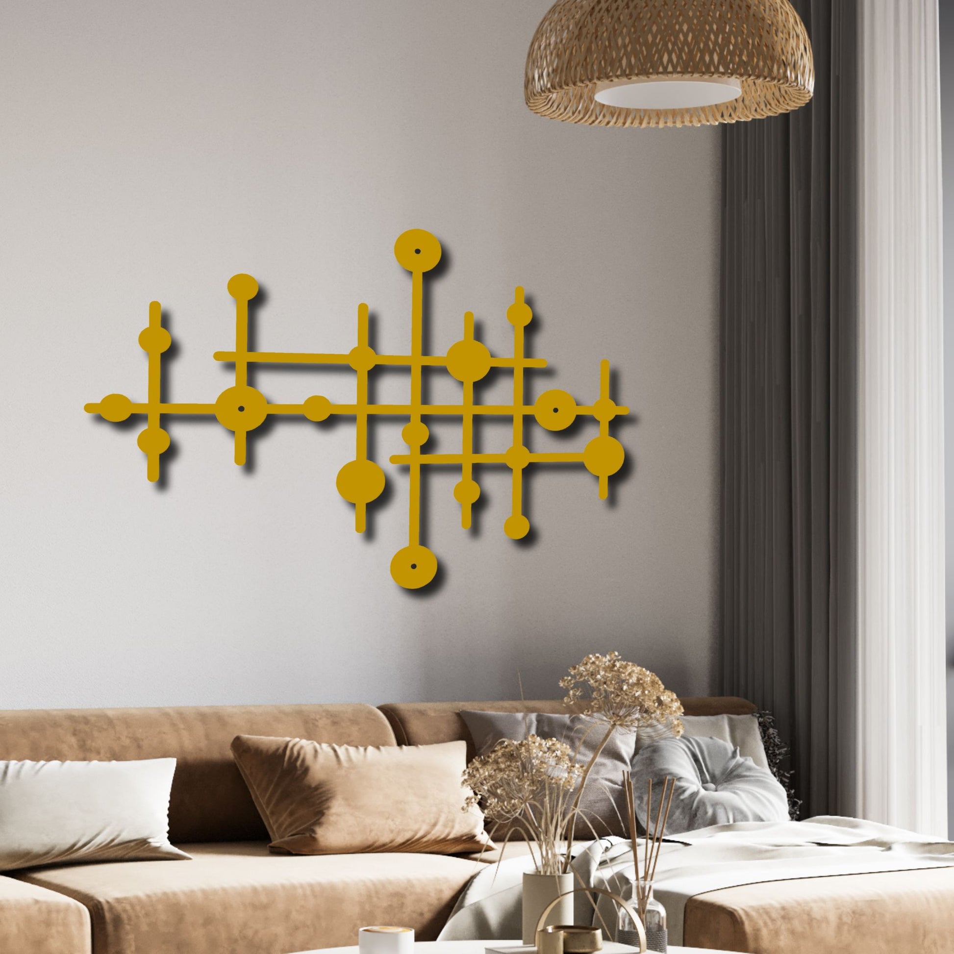 Yellow geometric wall art on a gray wall above a beige sofa.