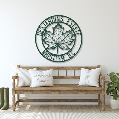 Wooden bench with decorative pillows and a wall art piece with a leaf design in a room.