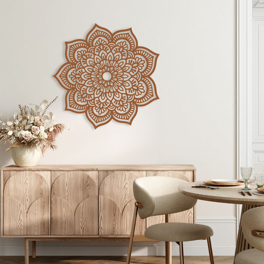 Decorative wall mandala above a wooden cabinet in a dining room setting.