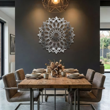 Dining room with wooden table and chairs, decorative wall art, and a modern light fixture.