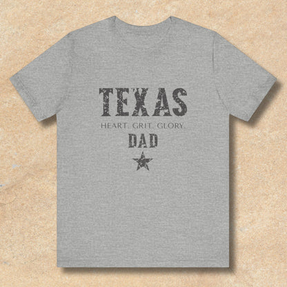 Gray t-shirt with 'Texas Dad' text on a beige background