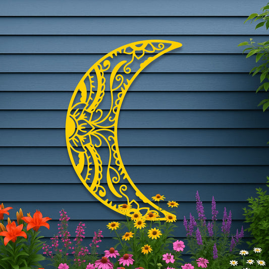 Decorative yellow crescent moon design on a blue wall with flowers in the foreground.