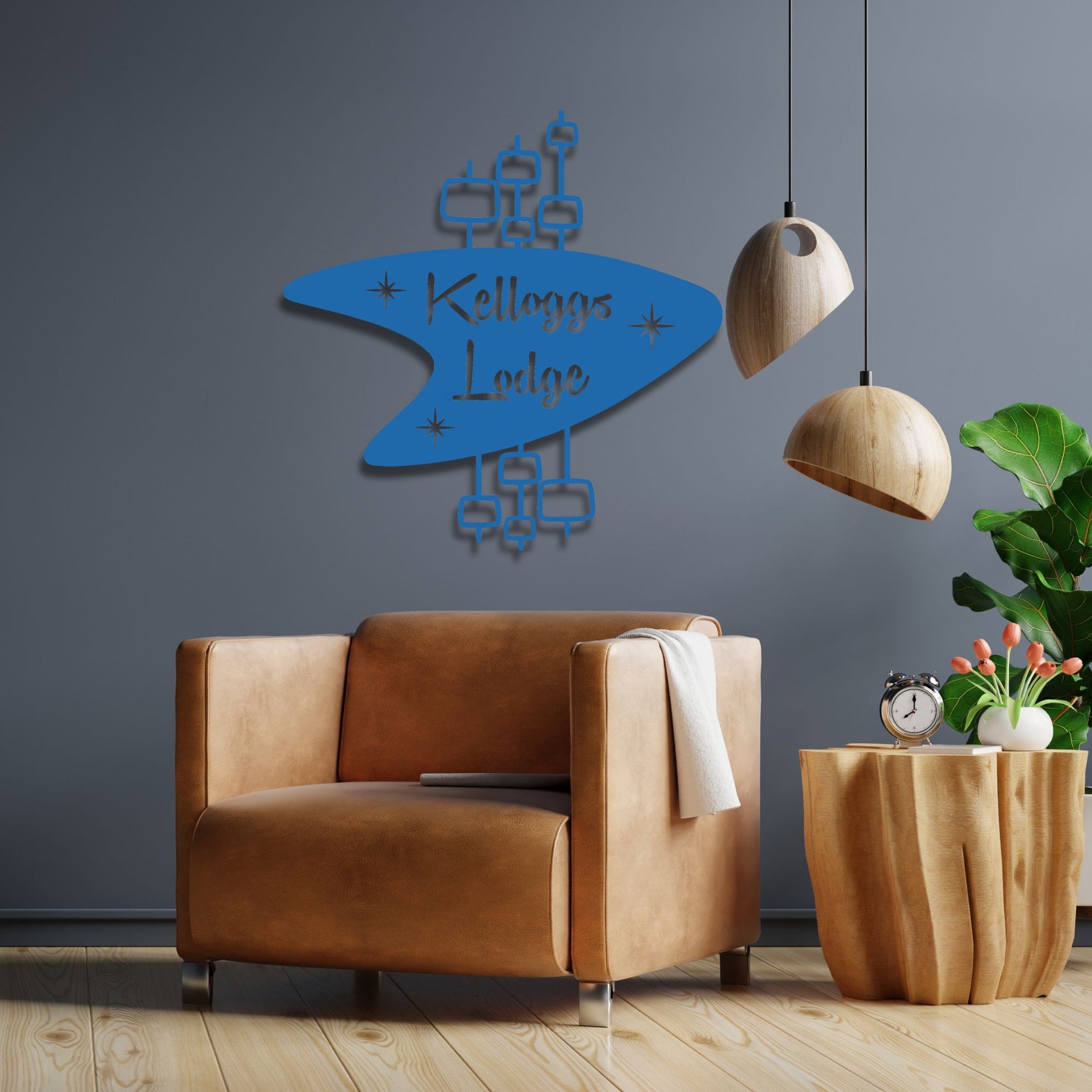 Personalized Mid Century Modern Name Sign shown in blue over modern reading nook drinking chair