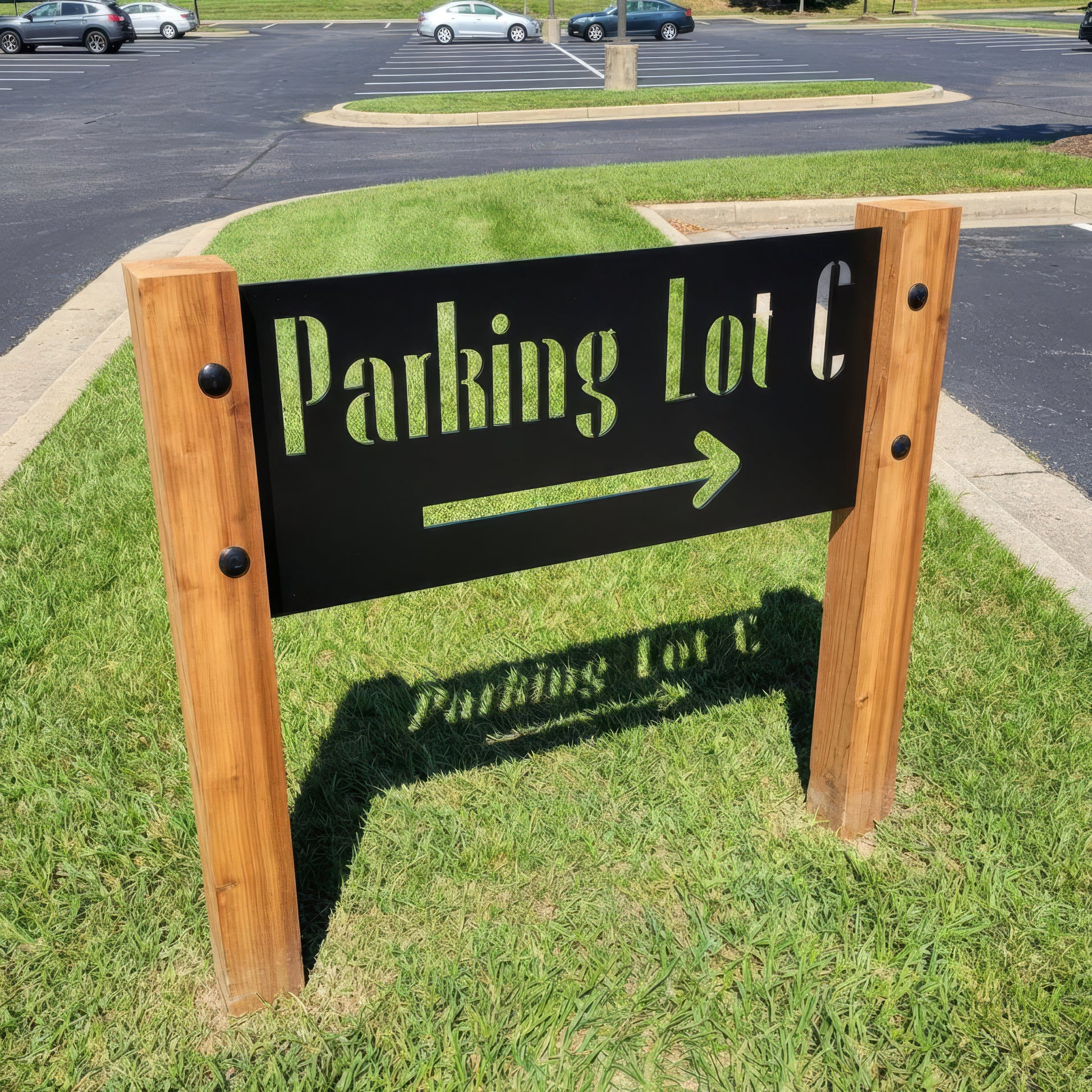 Parking lot sign with wooden frame on grass