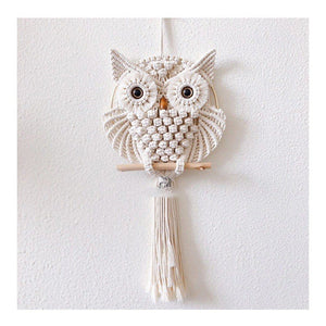 The owl tapestry was hand-woven