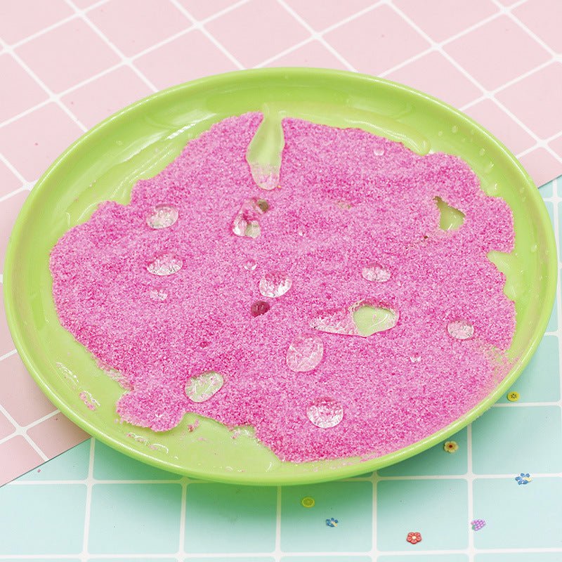 Colorful Magic Sand pink on plate