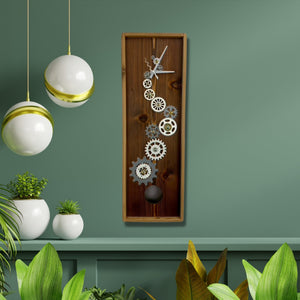 KingWood Pendulum Wall Clock w/ Gears, Cedar & Silver on green wall
