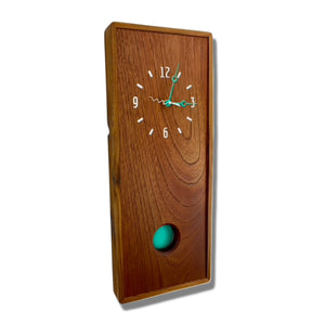 KingWood Pendulum Wall Clock In Cedar & Turquoise on left