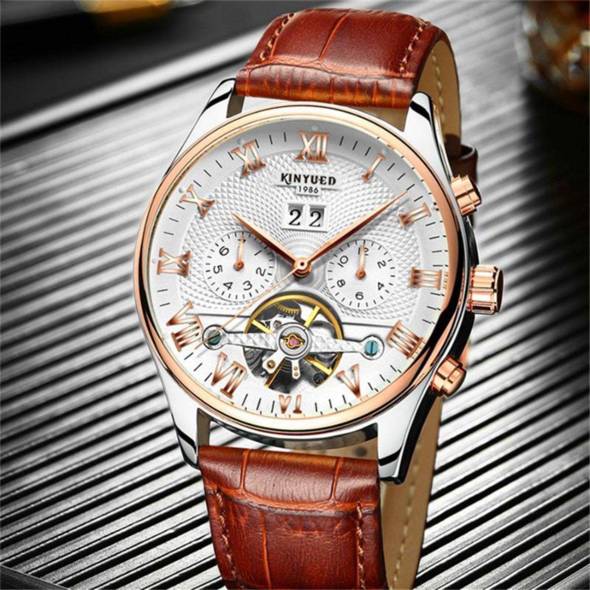 Swiss Tourbillon Mechanical Watch By KINYUED in brown displayed for gifting to man dad brother husband