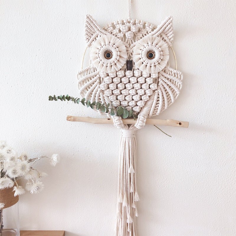 The owl tapestry was hand-woven