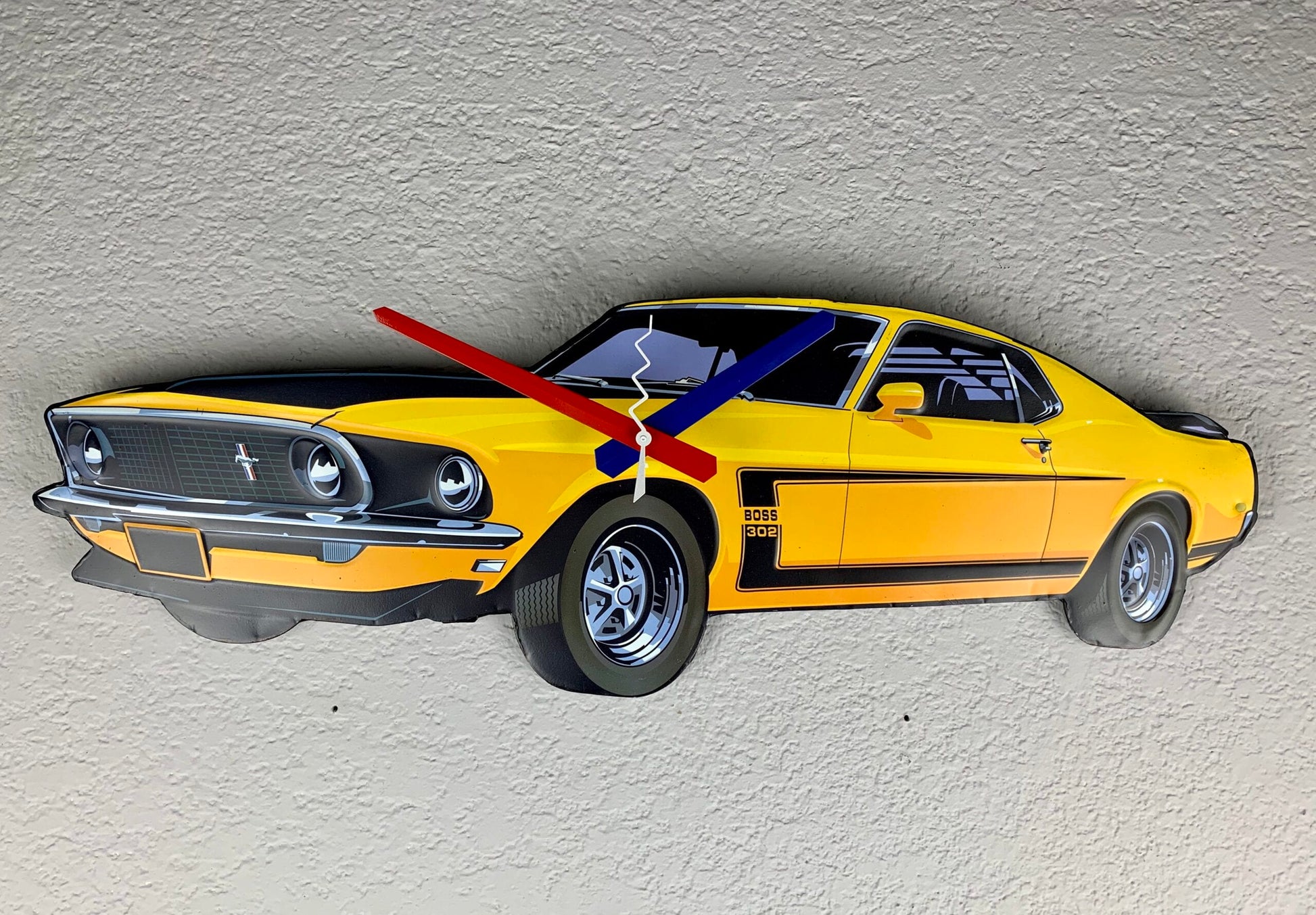 Ford Mustang Metal Wall Clock on grey wall