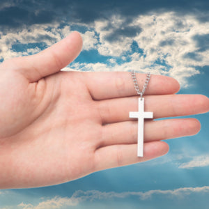 Sacred Cross Necklace, Bible Verse Psalm 61:2 shown in girls hand