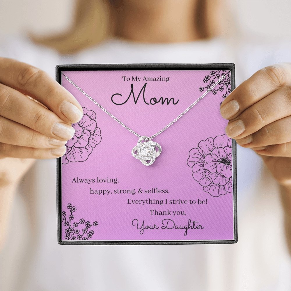 My Amazing Mom Love Knot Necklace & Card Gift Box held by daughter to mom