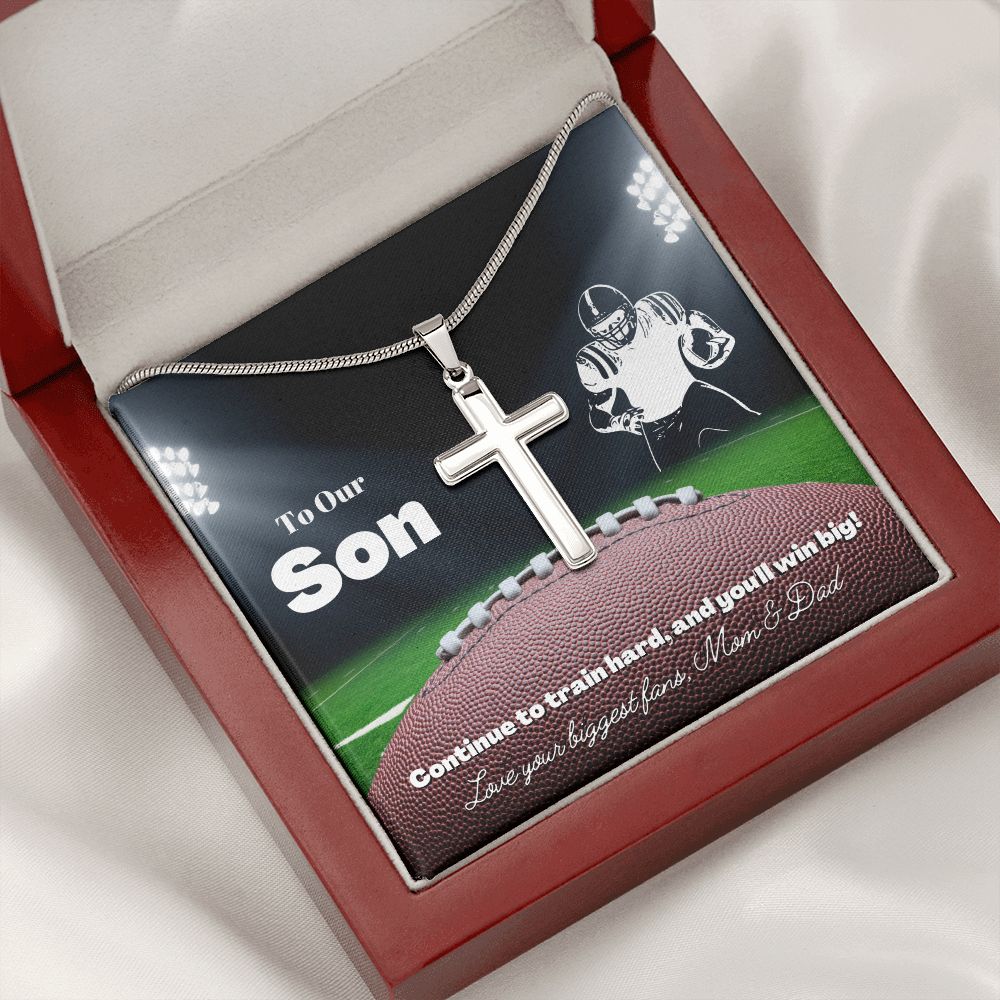 How do you end a long week? If it's screaming and cheering for your boy, we got just the sentiment. A charm necklace representing faith and persistence. Give your Son a meaningful piece of jewelry to celebrate him and his gridiron accomplishments! Our silver cross and snake chain is the perfect gift! Order today.